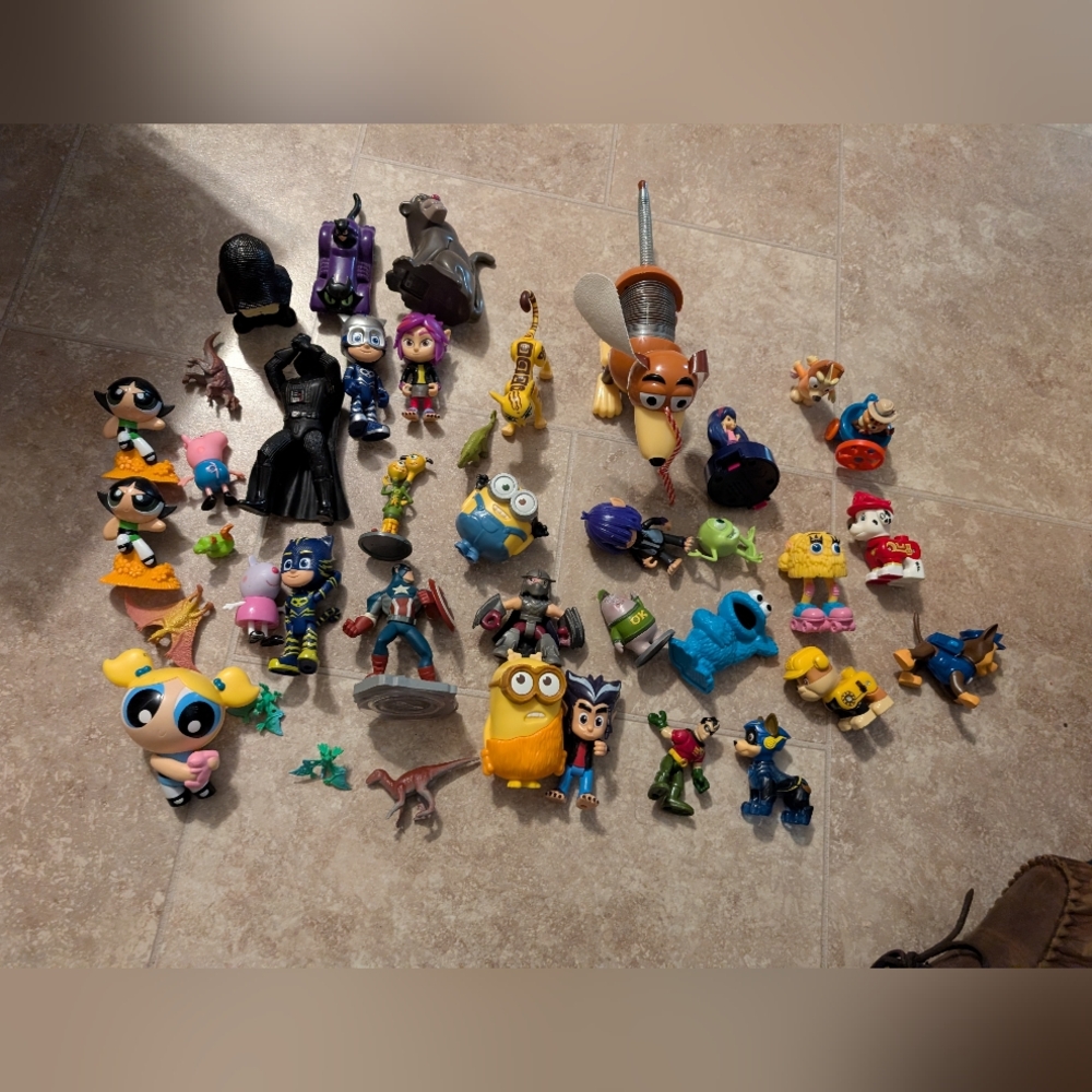 Lot Of 40 Misc...Toys Toy Story/Paw Patrol/Powder Puff/ Minion/Dinos And More